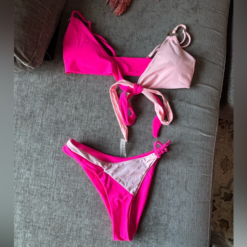 Two piece bathing suit, never worn. Super cute just not my style (: